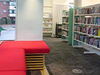 interior view showing window seat and bookshelves